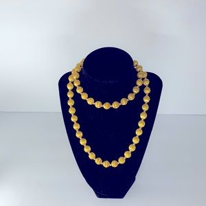 Vintage looking yellow threaded beaded necklace